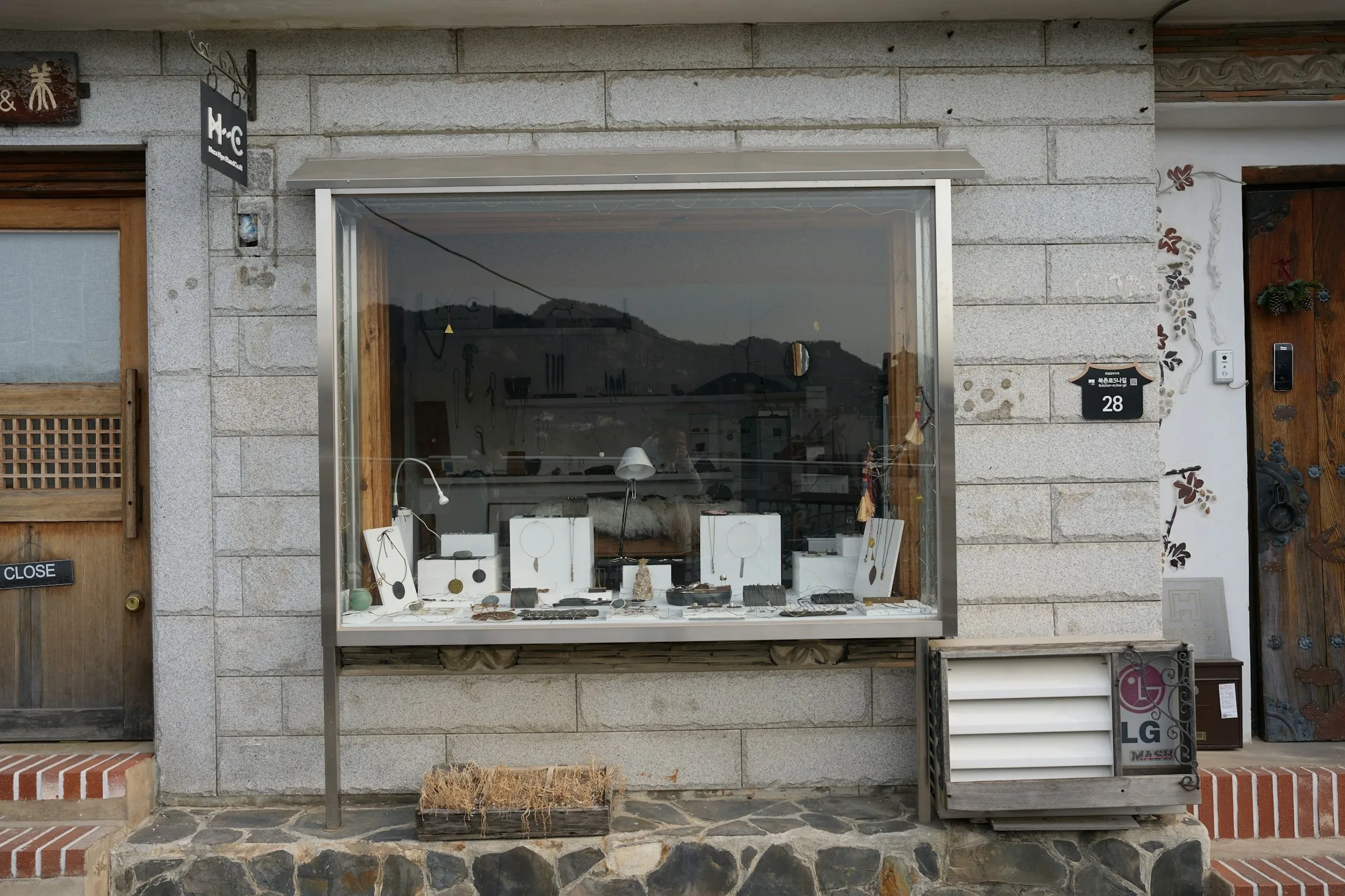 Boutique jewelry and accessories displayed in a window