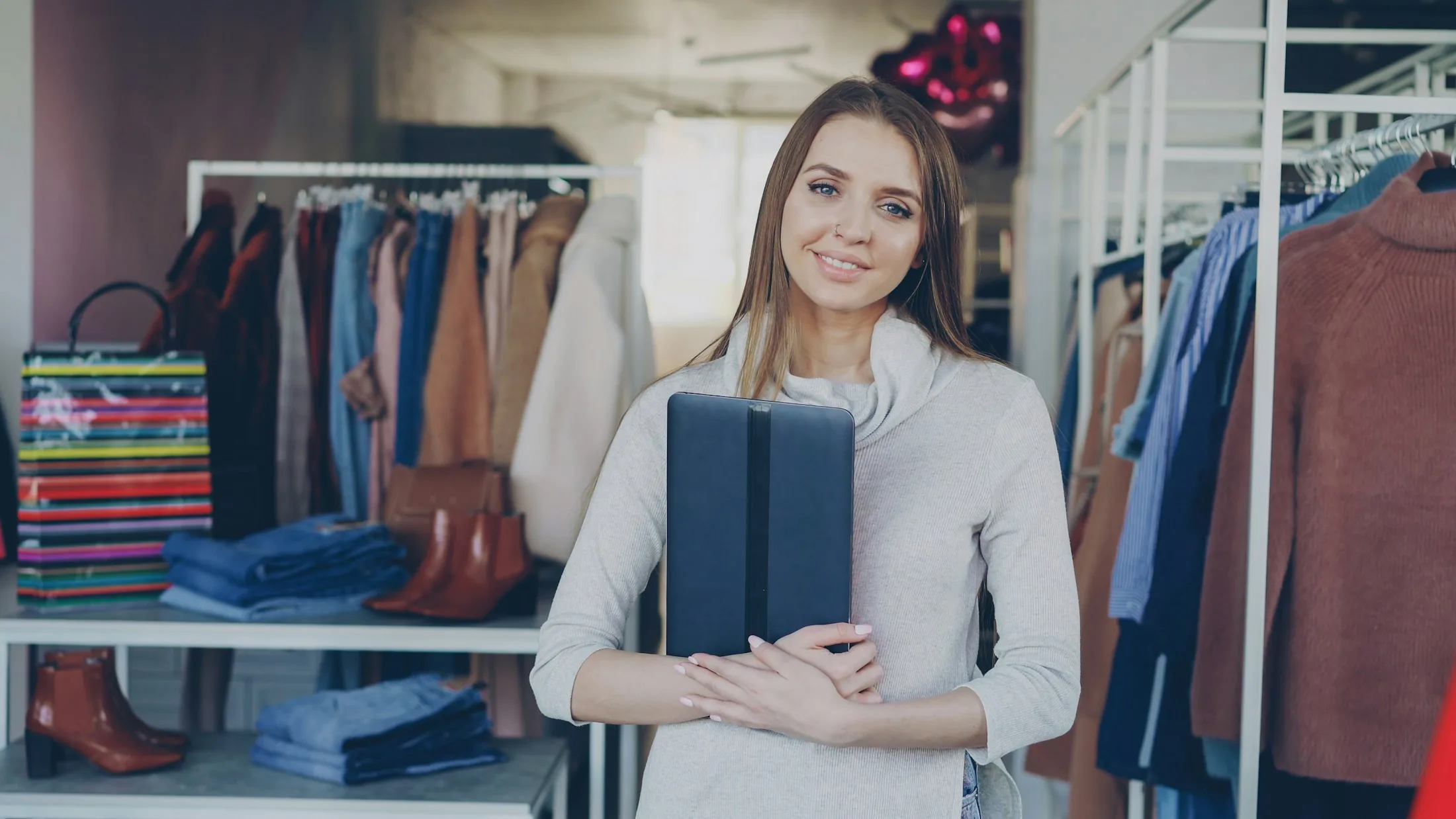 Boutique professional standing in a clothing store
