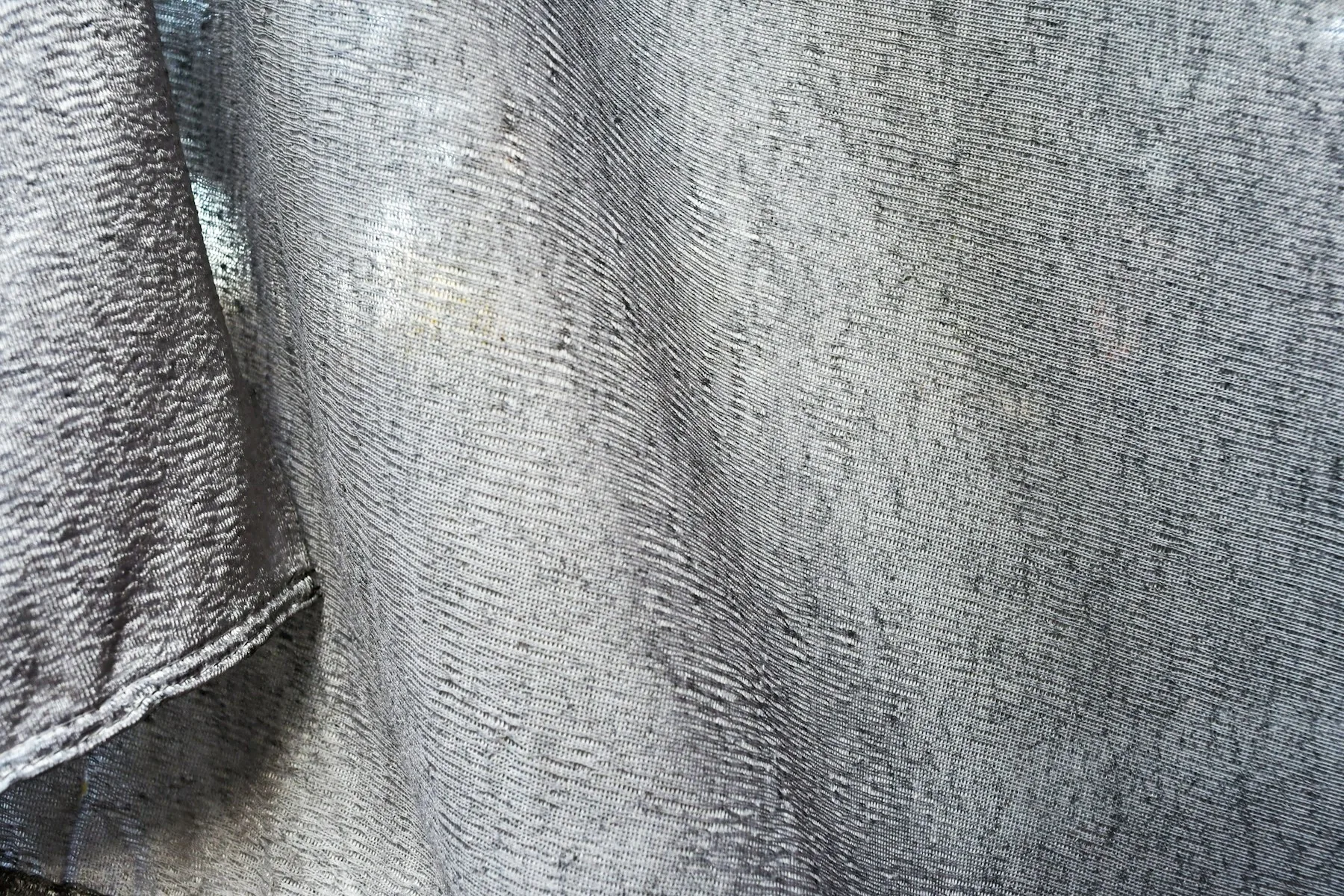 Close-up of gray stitched textile